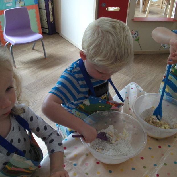 boy baking at hook-a-gate nursery