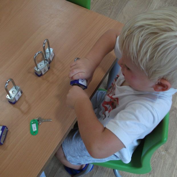 child learning numbers at hook-a-gate nursery