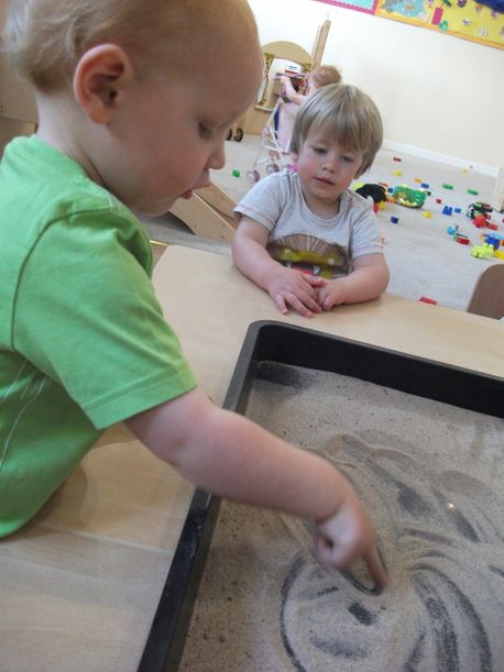 hook-a-gate nursery children playing with sand